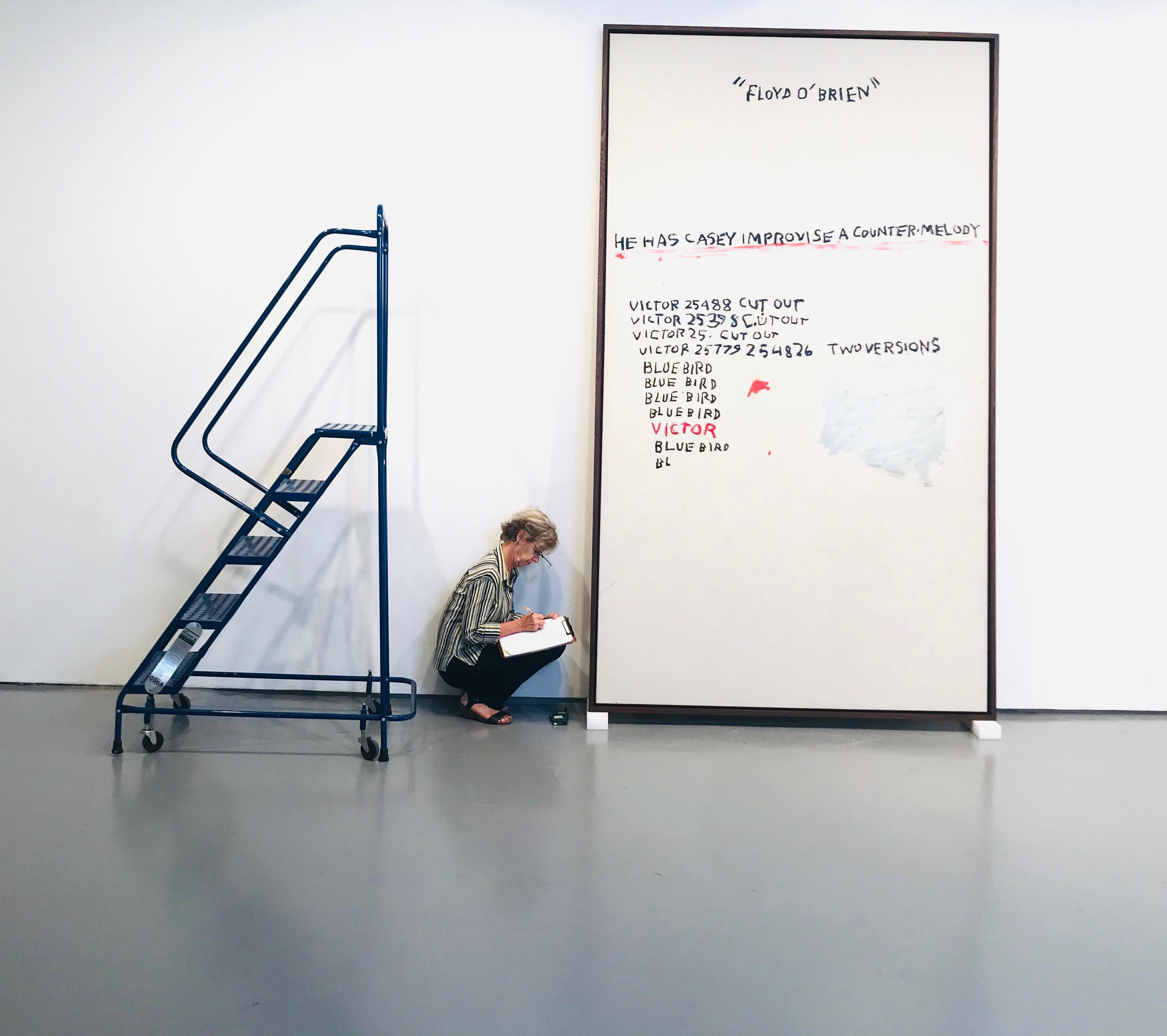 A conservator inspects Basquiat's 'Fats II' in a Crozier storage facility